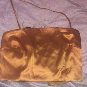 Gold silk crop top with a open back. Forever 21